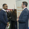job seekers and employers interacting at a job fair